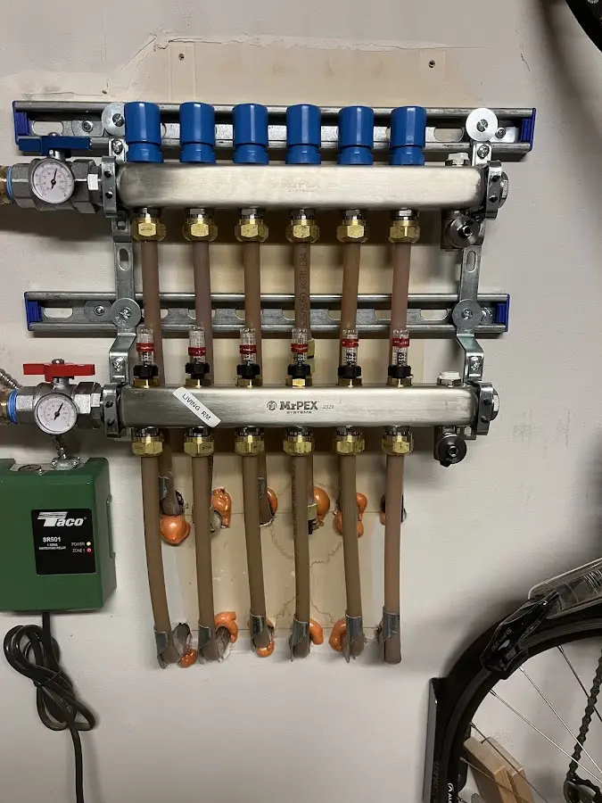 Plumber performing Water Heater Repair at a residential property in Sauk Village